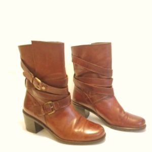 Stuart Weitzman leather wrap buckle boot.